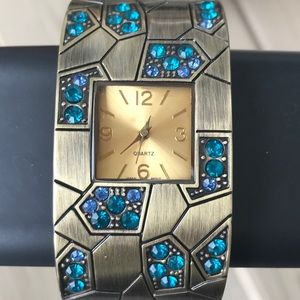 Bronze Gold Watch with Blue Gemstones 💎